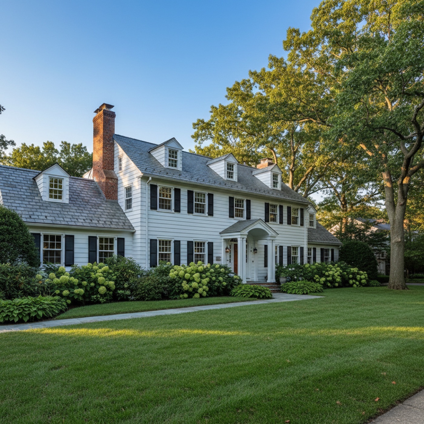 Classic Long Island colonial home with a natural slate roof
